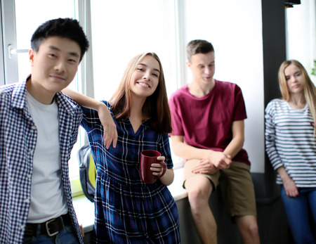 Students resting together in campus building