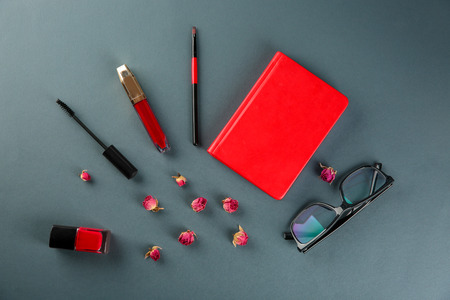 Composition with decorative cosmetics on dark backgroundの写真素材