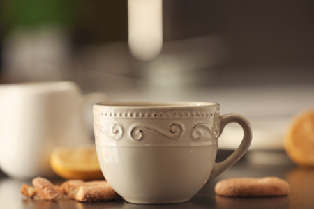 Cup with delicious tea on tableの写真素材