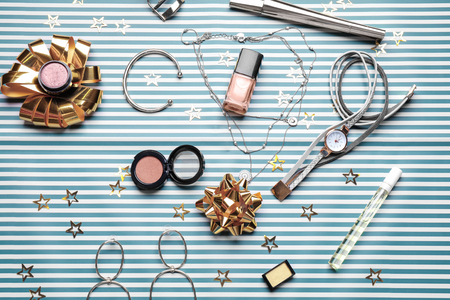 Set of decorative cosmetics and accessories on color backgroundの写真素材