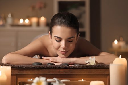 Young woman relaxing in spa salonの写真素材
