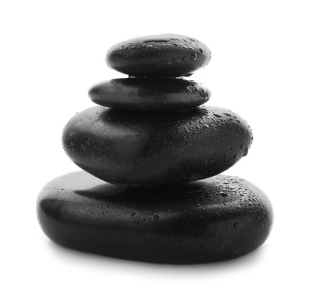 Stack of spa stones on white backgroundの写真素材