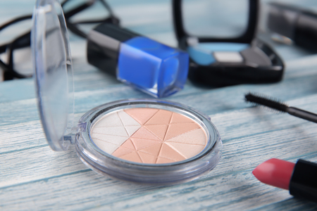 Decorative cosmetics on wooden backgroundの写真素材
