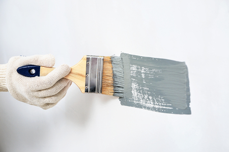 Painter using brush indoorsの写真素材