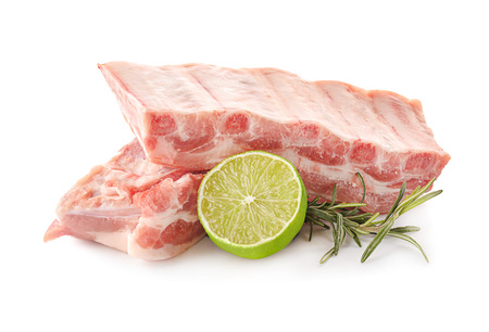 Raw pork ribs on white background. Fresh meat productsの写真素材