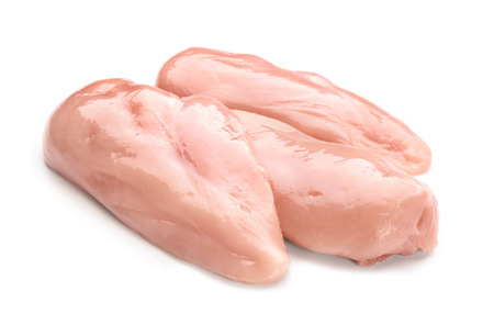 Raw chicken fillet on white backgroundの写真素材