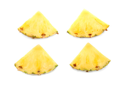 Slices of juicy pineapple on white background