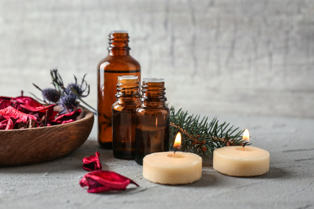 Composition with bottles of essential oils on table. Natural cosmeticsの写真素材