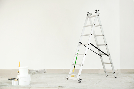 Painter's tools on floor indoorsの写真素材