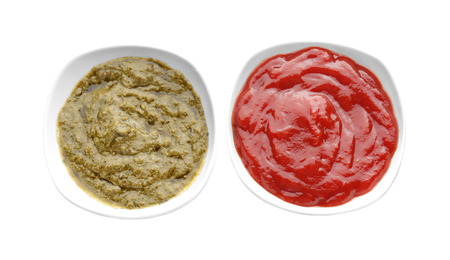 Tasty sauces in bowls on white backgroundの写真素材