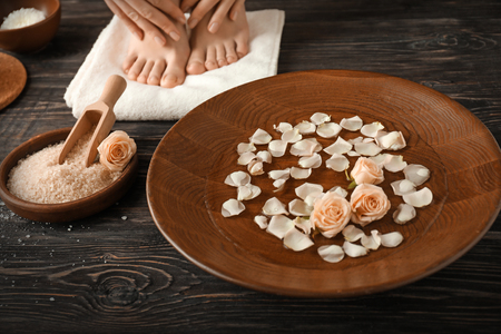 Young woman undergoing spa pedicure treatment in beauty salonの写真素材