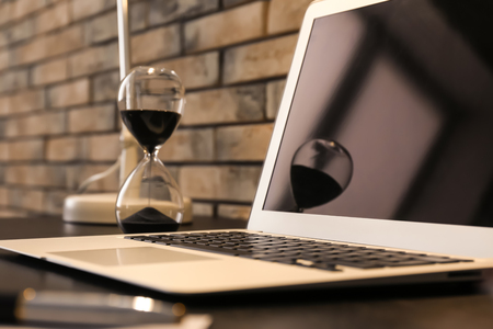 Comfortable workplace with laptop on table