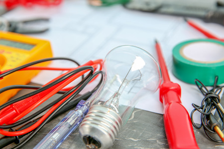 Different electrical tools on table