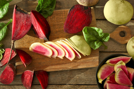 Flat lay composition with ripe fresh vegetables on wooden table