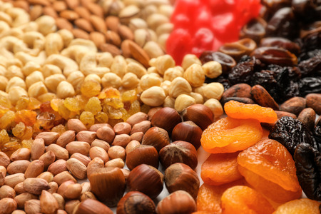 Different nuts, dried fruits and berries, closeupの写真素材