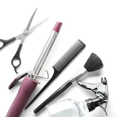 Professional hairdresser's tools on white background, top viewの写真素材