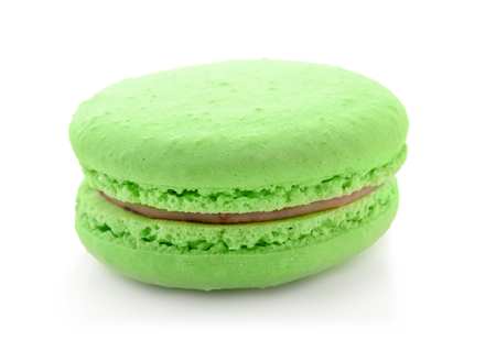 Delicious green macaron on white backgroundの写真素材