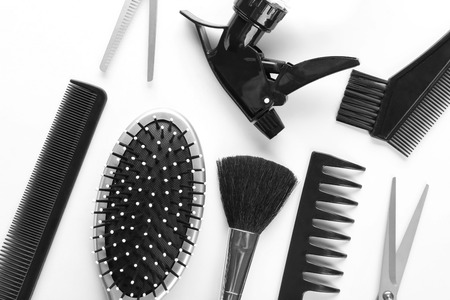 Professional hairdresser's tools on white background, top viewの写真素材