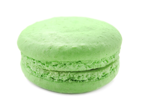Green tasty macaron on white backgroundの写真素材