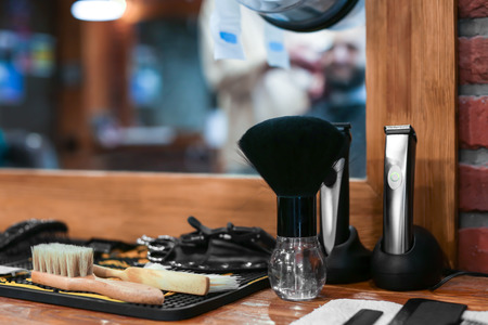 Professional tools on table in hairdressing salonの写真素材