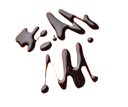 Pattern made with molten chocolate on white backgroundの写真素材