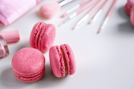 Tasty pink macarons on tableの写真素材
