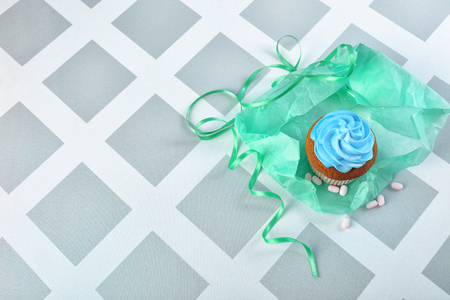 Delicious cupcake on color background. Mother's Day celebrationの写真素材