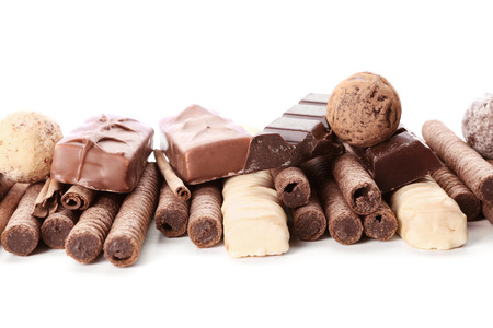 Delicious chocolate with cinnamon on  white backgroundの写真素材