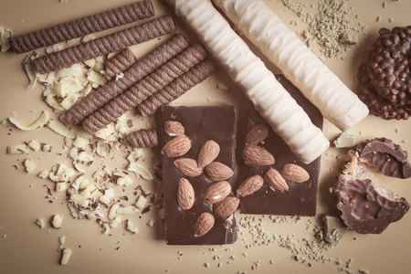 Composition with delicious chocolate and wafer sticks on tableの写真素材