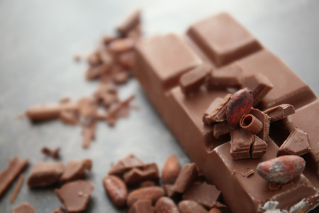 Delicious chocolate, cacao beans and shavings, closeupの写真素材