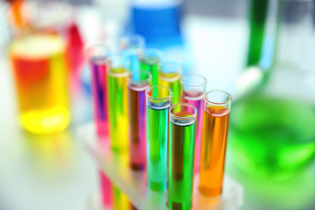 Test tubes with colorful samples in laboratory, closeupの写真素材