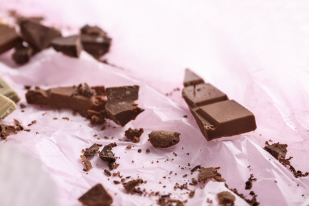 Delicious chocolate candies on parchmentの写真素材