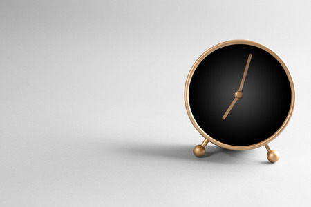 Alarm clock on light background. Time management conceptの写真素材