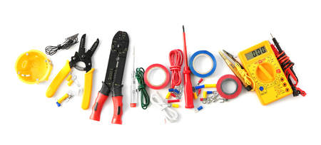 Electrician's supplies on white background