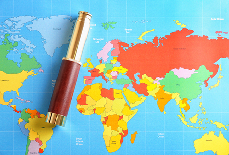 World map with spyglassの写真素材