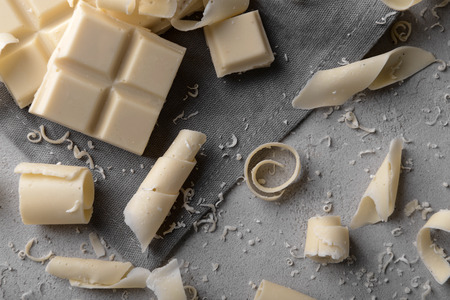 Chocolate curls on grey backgroundの写真素材