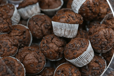 Fresh chocolate muffins in bakeryの写真素材