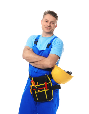 Mature electrician with tools and helmet on white backgroundの写真素材
