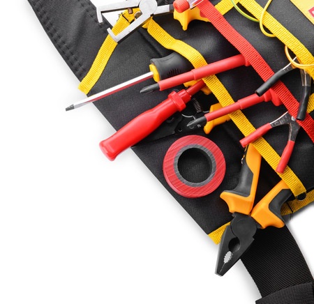 Electrician's supplies on white background