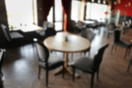 Interior of beautiful modern restaurant, blurred viewの写真素材