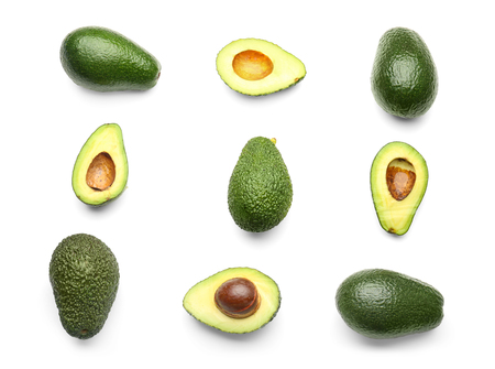 Ripe avocados on white background, flat lay