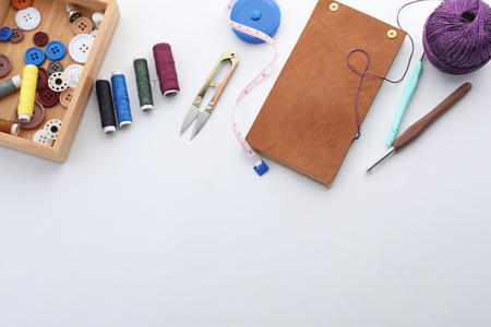 Set of sewing accessories on white backgroundの写真素材