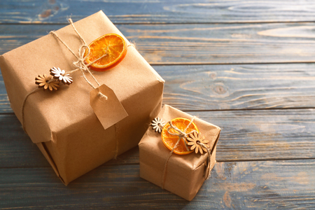 Beautiful gift boxes on wooden backgroundの写真素材