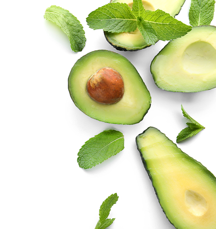 Fresh avocados on white background, flat lay