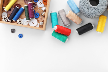 Set of sewing accessories on white backgroundの写真素材