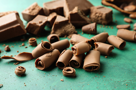 Delicious chocolate curls on color backgroundの写真素材