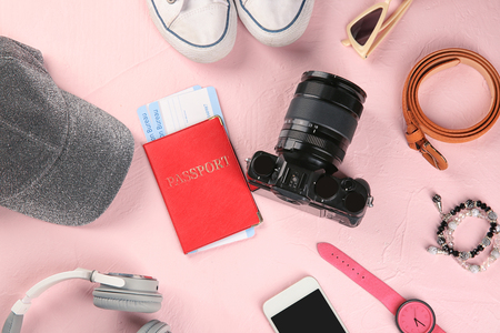 Composition with tourist's stuff on color background, top viewの写真素材