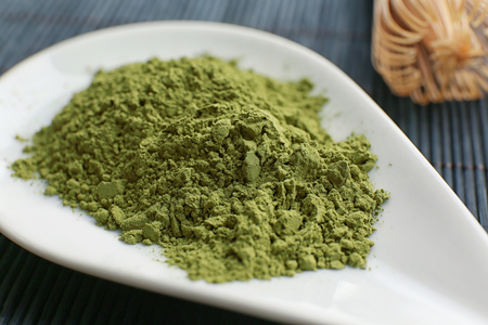 Plate with powdered matcha green tea, closeup