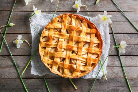 Tasty homemade apple pie on wooden tableの写真素材