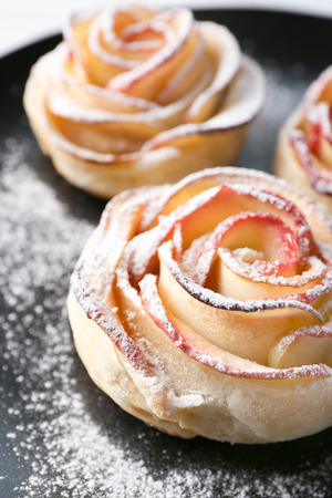 Tasty rose shaped apple pastry on plate, closeupの写真素材